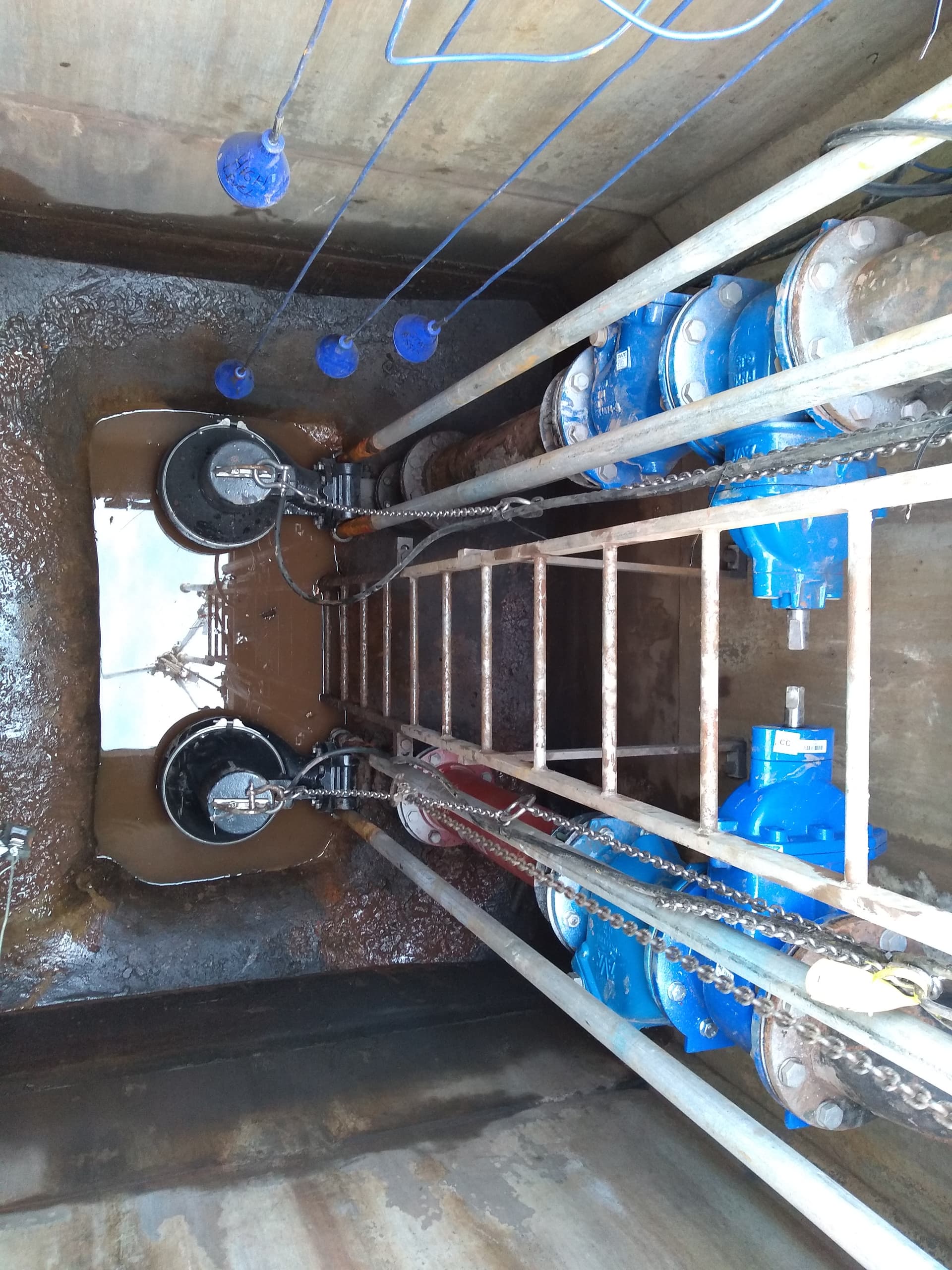New pumps and valves installed in a pumping station wet well